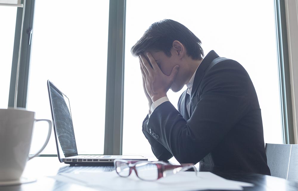 stressed headteacher before coaching in schools